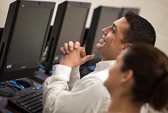 Male smiling sitting in class 